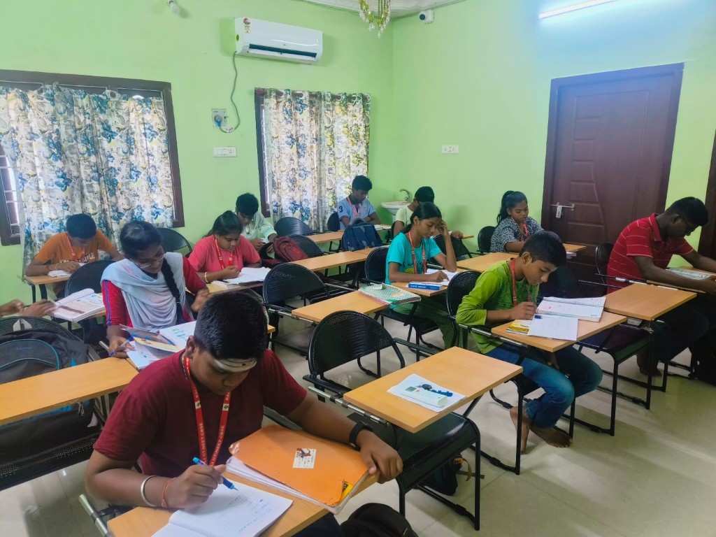 RALI students focused on learning in a guided classroom environment